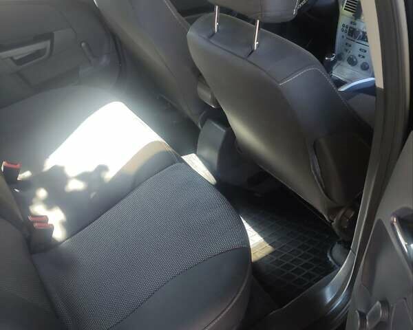 Черный Опель Астра, объемом двигателя 1.6 л и пробегом 205 тыс. км за 5700 $, фото 29 на Automoto.ua