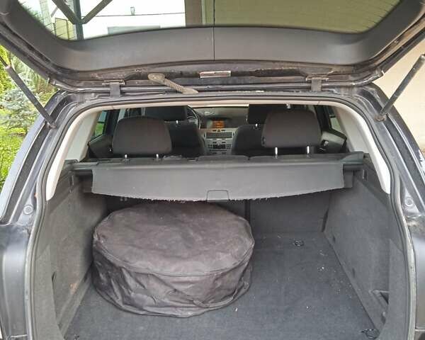 Черный Опель Астра, объемом двигателя 1.6 л и пробегом 168 тыс. км за 5400 $, фото 10 на Automoto.ua