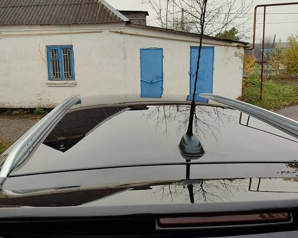 Черный Опель Астра, объемом двигателя 1.8 л и пробегом 225 тыс. км за 6800 $, фото 8 на Automoto.ua