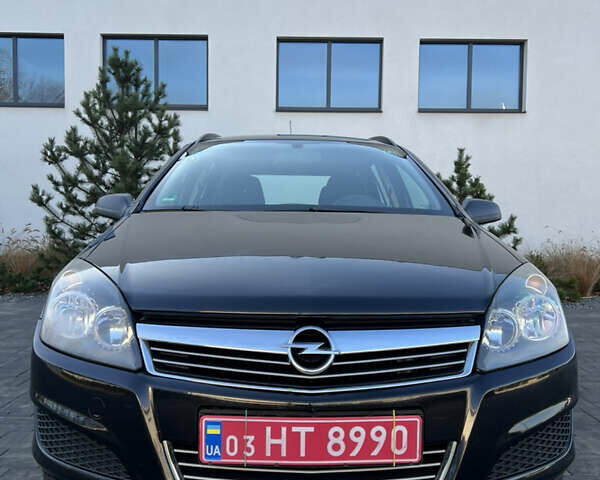 Черный Опель Астра, объемом двигателя 1.4 л и пробегом 242 тыс. км за 4450 $, фото 2 на Automoto.ua