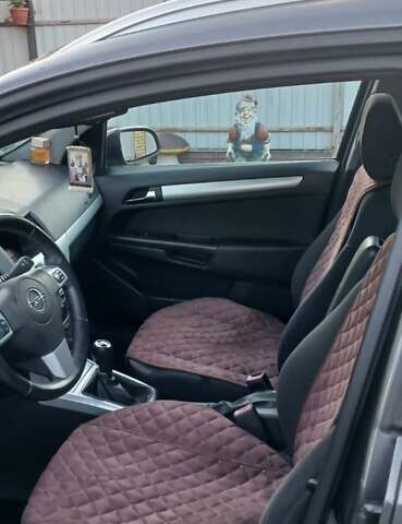 Черный Опель Астра, объемом двигателя 1.8 л и пробегом 164 тыс. км за 5500 $, фото 6 на Automoto.ua