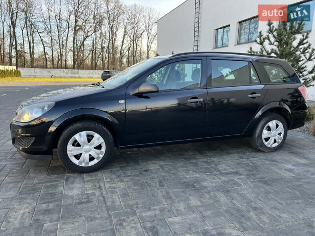 Черный Опель Астра, объемом двигателя 1.4 л и пробегом 242 тыс. км за 4450 $, фото 7 на Automoto.ua