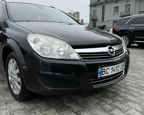 Черный Опель Астра, объемом двигателя 1.9 л и пробегом 255 тыс. км за 6200 $, фото 10 на Automoto.ua