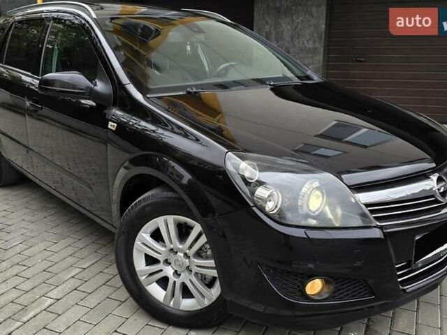 Черный Опель Астра, объемом двигателя 1.7 л и пробегом 224 тыс. км за 5650 $, фото 13 на Automoto.ua