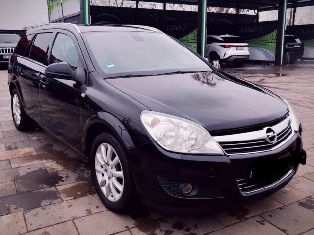 Черный Опель Астра, объемом двигателя 1.6 л и пробегом 230 тыс. км за 6300 $, фото 6 на Automoto.ua