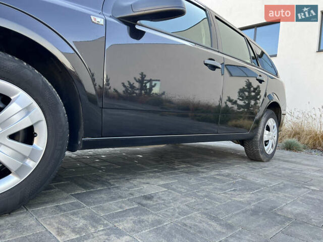 Черный Опель Астра, объемом двигателя 1.4 л и пробегом 242 тыс. км за 4450 $, фото 27 на Automoto.ua