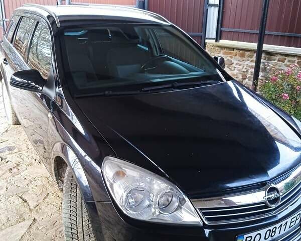 Черный Опель Астра, объемом двигателя 1.6 л и пробегом 168 тыс. км за 5400 $, фото 1 на Automoto.ua