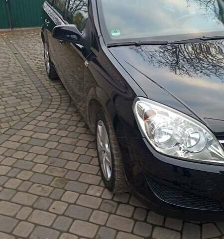 Черный Опель Астра, объемом двигателя 1.6 л и пробегом 249 тыс. км за 5650 $, фото 9 на Automoto.ua