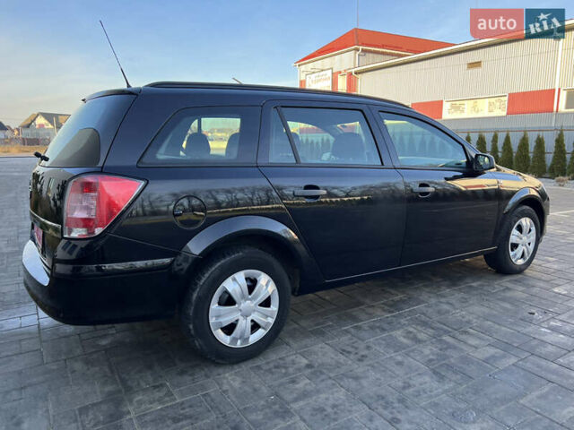 Черный Опель Астра, объемом двигателя 1.4 л и пробегом 242 тыс. км за 4450 $, фото 17 на Automoto.ua