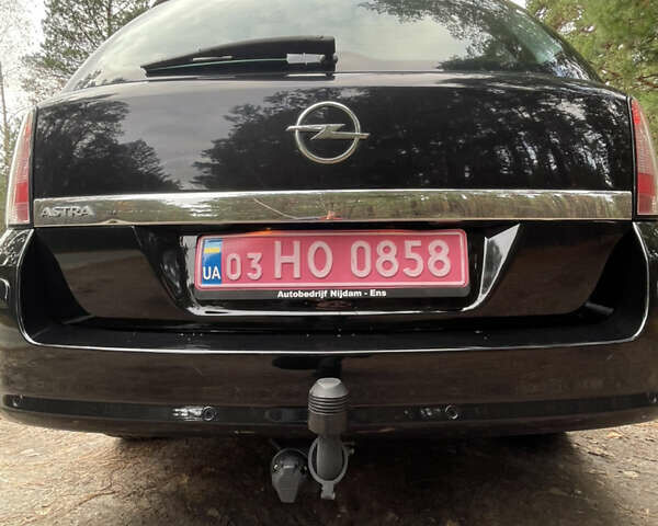 Черный Опель Астра, объемом двигателя 1.6 л и пробегом 191 тыс. км за 5999 $, фото 5 на Automoto.ua