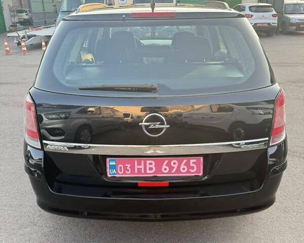 Черный Опель Астра, объемом двигателя 1.4 л и пробегом 170 тыс. км за 4900 $, фото 10 на Automoto.ua