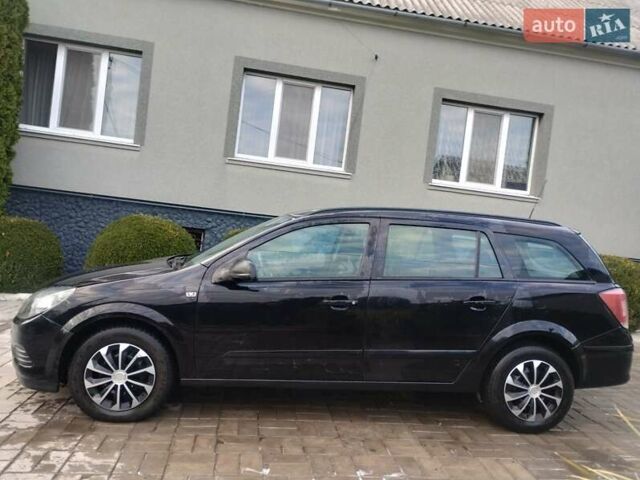 Черный Опель Астра, объемом двигателя 1.69 л и пробегом 308 тыс. км за 4500 $, фото 9 на Automoto.ua