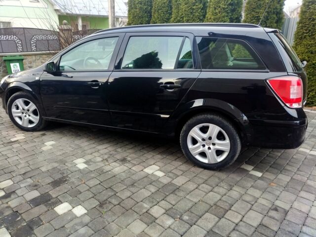 Черный Опель Астра, объемом двигателя 1.6 л и пробегом 220 тыс. км за 5800 $, фото 1 на Automoto.ua