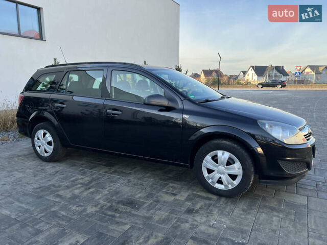 Черный Опель Астра, объемом двигателя 1.4 л и пробегом 242 тыс. км за 4450 $, фото 22 на Automoto.ua