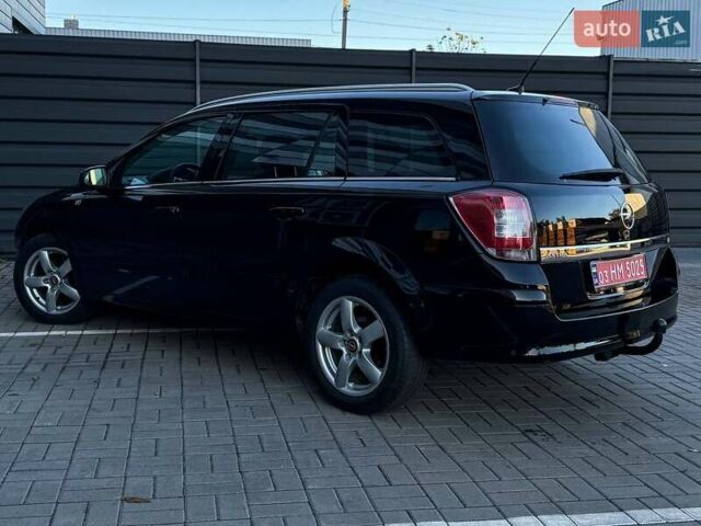 Черный Опель Астра, объемом двигателя 1.6 л и пробегом 160 тыс. км за 6200 $, фото 29 на Automoto.ua