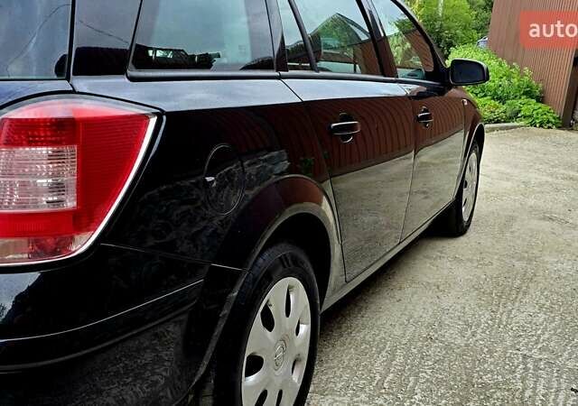 Черный Опель Астра, объемом двигателя 1.6 л и пробегом 238 тыс. км за 6299 $, фото 21 на Automoto.ua