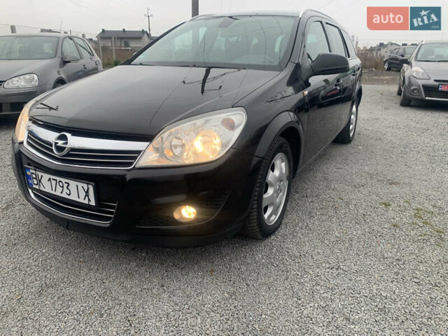 Черный Опель Астра, объемом двигателя 1.6 л и пробегом 232 тыс. км за 5500 $, фото 12 на Automoto.ua