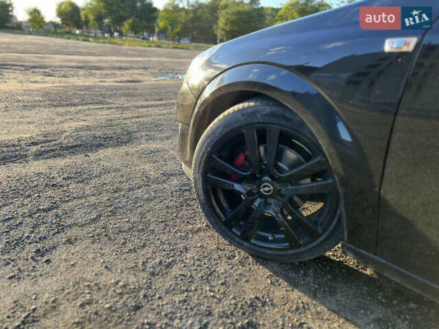 Черный Опель Астра, объемом двигателя 1.6 л и пробегом 261 тыс. км за 5600 $, фото 12 на Automoto.ua