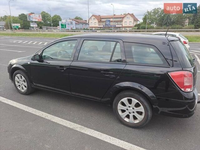 Черный Опель Астра, объемом двигателя 1.6 л и пробегом 212 тыс. км за 5200 $, фото 6 на Automoto.ua