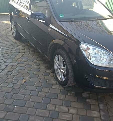 Черный Опель Астра, объемом двигателя 1.6 л и пробегом 249 тыс. км за 5650 $, фото 1 на Automoto.ua