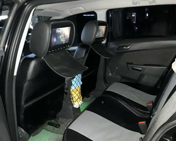 Черный Опель Астра, объемом двигателя 1.7 л и пробегом 321 тыс. км за 5500 $, фото 9 на Automoto.ua