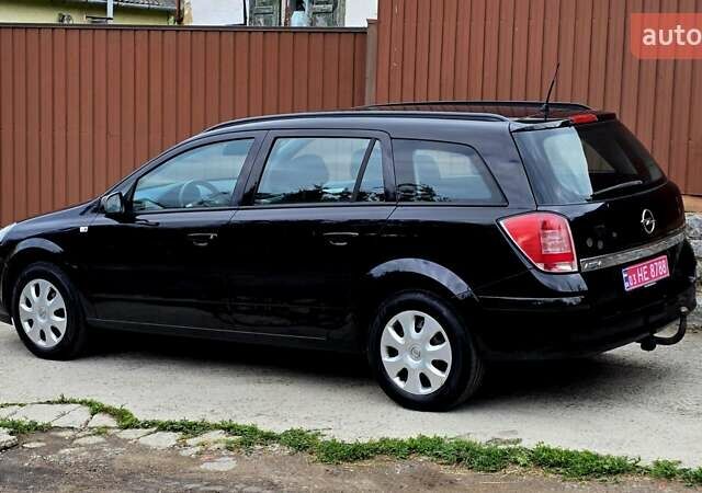 Черный Опель Астра, объемом двигателя 1.6 л и пробегом 238 тыс. км за 6299 $, фото 28 на Automoto.ua