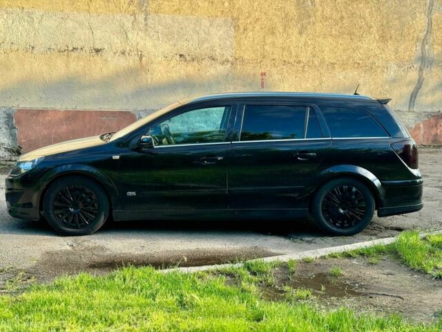 Черный Опель Астра, объемом двигателя 1.6 л и пробегом 219 тыс. км за 4510 $, фото 7 на Automoto.ua