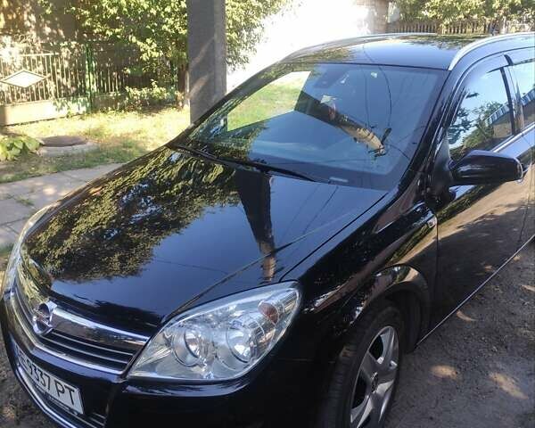 Черный Опель Астра, объемом двигателя 1.6 л и пробегом 205 тыс. км за 5700 $, фото 2 на Automoto.ua