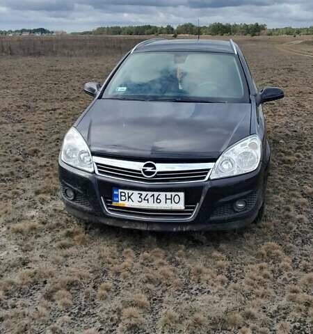 Черный Опель Астра, объемом двигателя 1.9 л и пробегом 266 тыс. км за 5550 $, фото 1 на Automoto.ua