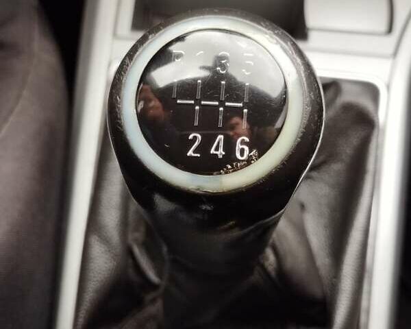 Черный Опель Астра, объемом двигателя 1.25 л и пробегом 325 тыс. км за 4699 $, фото 12 на Automoto.ua