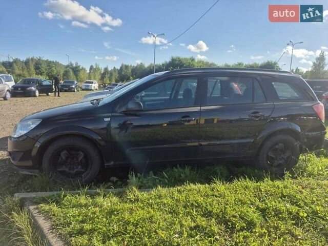 Черный Опель Астра, объемом двигателя 1.6 л и пробегом 200 тыс. км за 4900 $, фото 1 на Automoto.ua