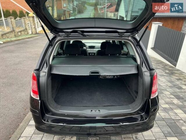 Черный Опель Астра, объемом двигателя 1.6 л и пробегом 199 тыс. км за 6499 $, фото 60 на Automoto.ua