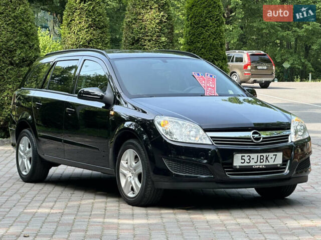 Черный Опель Астра, объемом двигателя 1.6 л и пробегом 157 тыс. км за 5499 $, фото 45 на Automoto.ua