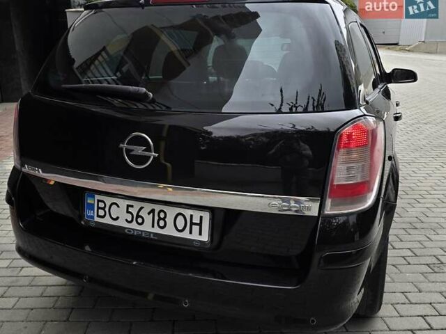 Черный Опель Астра, объемом двигателя 1.7 л и пробегом 224 тыс. км за 5599 $, фото 8 на Automoto.ua