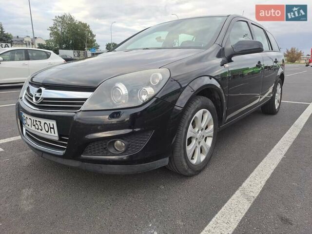 Черный Опель Астра, объемом двигателя 1.6 л и пробегом 212 тыс. км за 5200 $, фото 3 на Automoto.ua