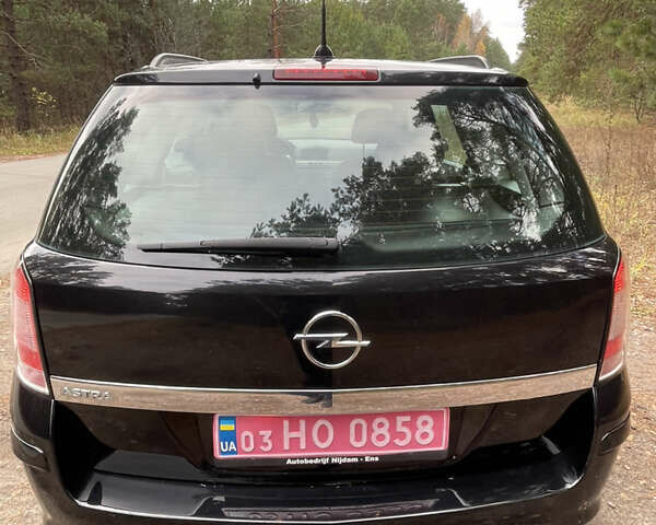 Черный Опель Астра, объемом двигателя 1.6 л и пробегом 191 тыс. км за 5999 $, фото 6 на Automoto.ua
