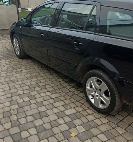 Черный Опель Астра, объемом двигателя 1.6 л и пробегом 249 тыс. км за 5650 $, фото 8 на Automoto.ua