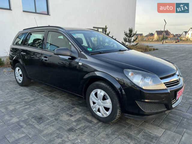 Черный Опель Астра, объемом двигателя 1.4 л и пробегом 242 тыс. км за 4450 $, фото 23 на Automoto.ua