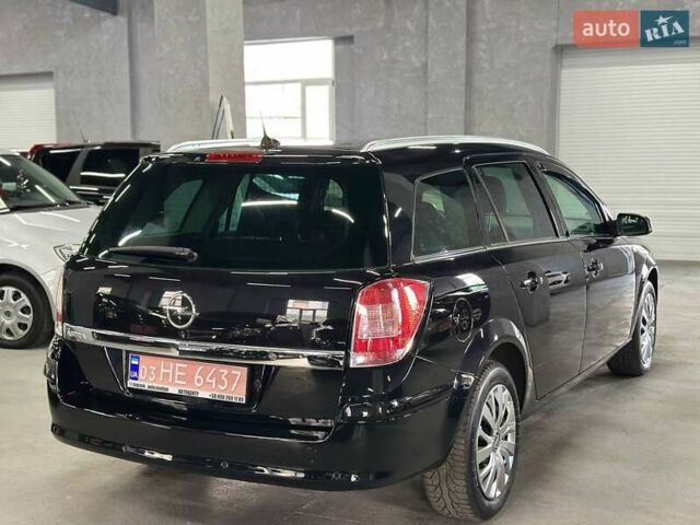 Черный Опель Астра, объемом двигателя 1.6 л и пробегом 186 тыс. км за 6799 $, фото 6 на Automoto.ua