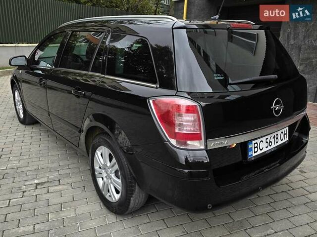 Черный Опель Астра, объемом двигателя 1.7 л и пробегом 224 тыс. км за 5599 $, фото 6 на Automoto.ua