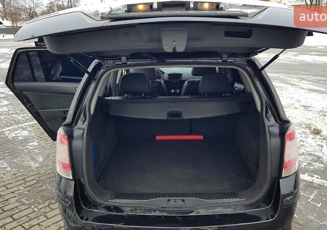 Черный Опель Астра, объемом двигателя 1.7 л и пробегом 332 тыс. км за 5599 $, фото 17 на Automoto.ua