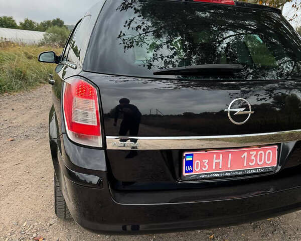 Черный Опель Астра, объемом двигателя 1.6 л и пробегом 230 тыс. км за 5750 $, фото 25 на Automoto.ua