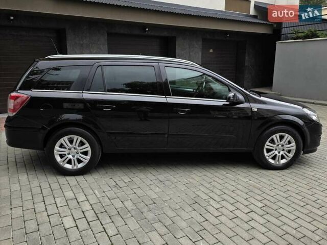 Черный Опель Астра, объемом двигателя 1.7 л и пробегом 224 тыс. км за 5599 $, фото 11 на Automoto.ua