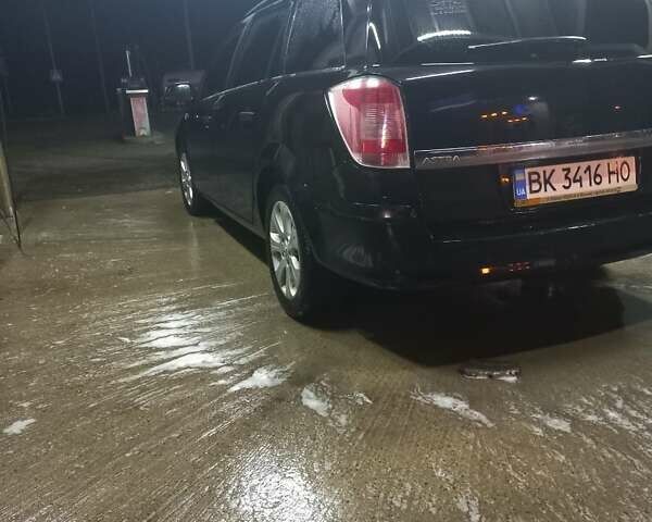 Черный Опель Астра, объемом двигателя 1.9 л и пробегом 266 тыс. км за 5550 $, фото 16 на Automoto.ua