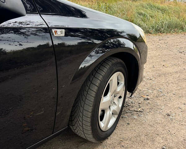 Черный Опель Астра, объемом двигателя 1.6 л и пробегом 230 тыс. км за 5750 $, фото 22 на Automoto.ua