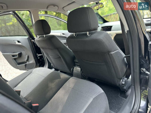 Черный Опель Астра, объемом двигателя 1.6 л и пробегом 157 тыс. км за 5499 $, фото 125 на Automoto.ua
