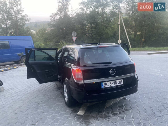 Черный Опель Астра, объемом двигателя 1.7 л и пробегом 224 тыс. км за 4700 $, фото 9 на Automoto.ua