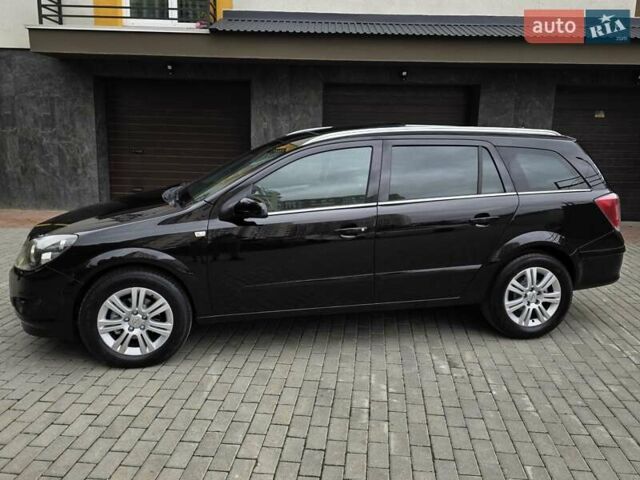 Черный Опель Астра, объемом двигателя 1.7 л и пробегом 224 тыс. км за 5599 $, фото 4 на Automoto.ua