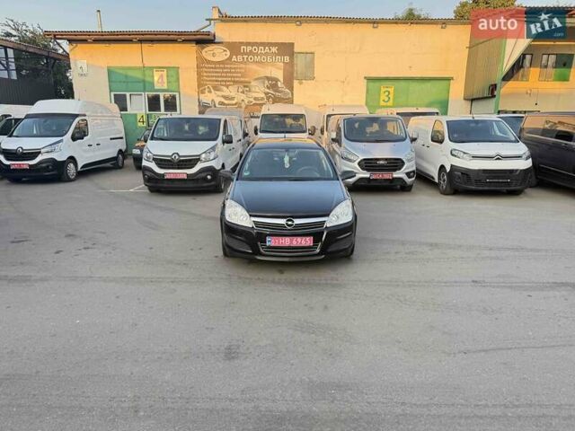 Черный Опель Астра, объемом двигателя 1.4 л и пробегом 170 тыс. км за 4900 $, фото 1 на Automoto.ua