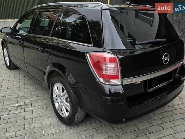 Черный Опель Астра, объемом двигателя 1.7 л и пробегом 224 тыс. км за 5650 $, фото 6 на Automoto.ua